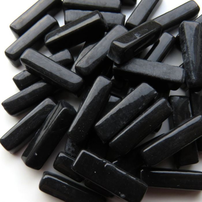 Bâtonnets noir , 20 mm x 6 mm , par 100 g .